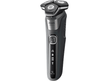 Charger l'image dans la galerie, Un rasoir électrique gris foncé avec trois têtes rotatives et un bouton d'alimentation.