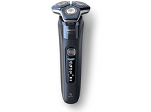 Charger l'image dans la galerie, Gros plan d'une buse de sèche-cheveux avec une grille interne violette.