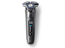 Charger l'image dans la galerie, Rasoir électrique Philips, design noir et bleu.