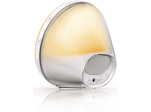 Charger l'image dans la galerie, Une lampe de chevet blanche et transparente avec un haut-parleur et des boutons. Le fond est blanc.