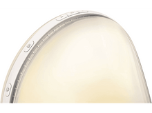 Charger l'image dans la galerie, Une lampe de luminothérapie blanche avec des boutons de commande sur le côté, brillant vivement.