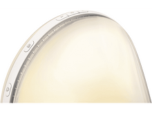 Charger l'image dans la galerie, Un réveil blanc avec un design incurvé et des boutons sur le côté, brillant.