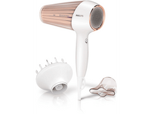 Charger l'image dans la galerie, Sèche-cheveux Philips blanc et or rose avec trois accessoires. Il dispose de Ionic et Moisture Protect.