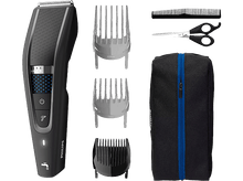 Charger l'image dans la galerie, Ensemble tondeuse à cheveux Philips noire avec différents accessoires, ciseaux et un sac.