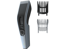 Charger l'image dans la galerie, Tondeuse à cheveux avec réglages de longueur réglables et deux peignes.