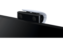Charger l'image dans la galerie, Une caméra PlayStation 5 en noir et blanc, positionnée au-dessus d'un téléviseur.