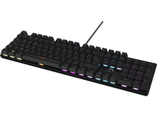 Charger l'image dans la galerie, Un clavier noir avec plusieurs touches colorées et un câble de connexion, sur une surface blanche.