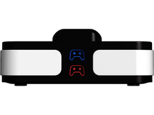 Charger l'image dans la galerie, Un appareil de jeu noir avec des côtés blancs et des symboles de contrôleur en rouge et bleu.