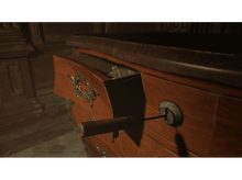 Charger l'image dans la galerie, Un tiroir en bois partiellement ouvert, révélant des objets à l'intérieur, et une clé dans la serrure.