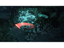 Charger l'image dans la galerie, Un personnage avec une épée rouge tranchant une zone bleue lumineuse dans une grotte sombre.