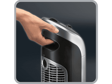 Charger l'image dans la galerie, Une main touchant un ventilateur noir et argenté, montrant le panneau de contrôle avec des boutons.