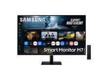 Charger l'image dans la galerie, Samsung Smart Monitor M7. Affiche des applications de streaming. Comprend une télécommande. Affiche des aperçus de hockey et d'émissions de télévision.