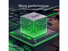 Charger l'image dans la galerie, Un cube vert avec un affichage numérique sur une carte de circuit imprimé. Texte : Plus de performances grâce à la technologie GaN.