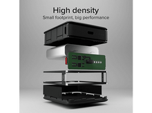 Charger l'image dans la galerie, Vue éclatée d'une batterie externe noire, montrant ses composants.