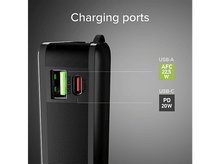 Charger l'image dans la galerie, Une batterie externe noire montrant les ports de charge USB-A et USB-C avec indicateurs.