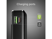 Charger l'image dans la galerie, Gros plan d'une batterie externe montrant les ports de charge : USB-A, USB-C.