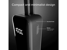 Charger l'image dans la galerie, Appareil noir avec un écran affichant le pourcentage. Il a une finition moletée et un bouton.