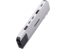 Charger l'image dans la galerie, Un hub USB-C SITECOM argenté avec divers ports, incliné, isolé sur fond noir.