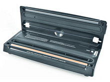 Charger l'image dans la galerie, Une scelleuse sous vide noire. Le couvercle est ouvert. L'intérieur est visible. Texte : Attention.