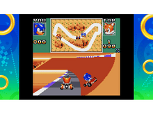 Charger l'image dans la galerie, Sonic et Tails font la course en karts. Deux écrans affichent la course.