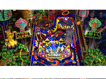Charger l'image dans la galerie, Une machine de flipper colorée avec des personnages de Sonic. Bâtiments en arrière-plan.