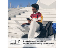 Charger l'image dans la galerie, Une batterie externe noire avec un affichage numérique indiquant un pourcentage.