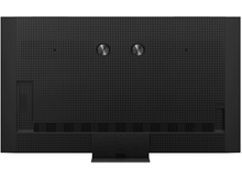 Charger l'image dans la galerie, Un salon avec une télévision affichant une scène de montagne.