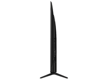 Charger l'image dans la galerie, Une vue latérale d'une TV montrant les ports et les connexions, avec un support noir.