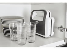 Charger l'image dans la galerie, Armoire avec assiettes, verres et gaufrier. Armoire blanche avec porte ouverte.