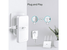 Charger l'image dans la galerie, Un appareil branché dans un mur, montrant comment l'appairer avec un autre appareil et un routeur.