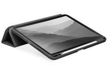 Charger l'image dans la galerie, Tablette avec une couverture noire. L'écran affiche une image de paysage.