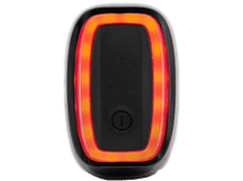 Charger l'image dans la galerie, Lumière noire de forme ovale avec une bordure rouge illuminée. Il y a un bouton d'alimentation sur l'appareil.