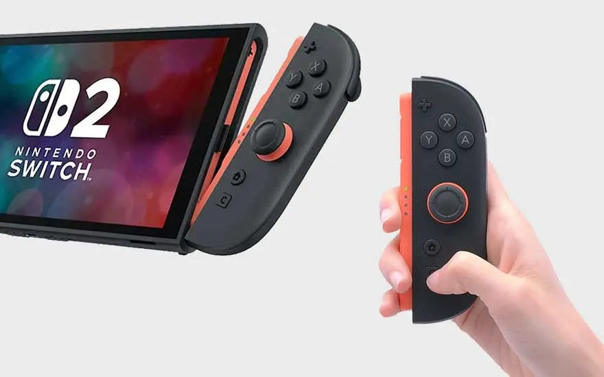 Une personne tient un joycon détachable dans sa main devant une Nintendo Switch 2.