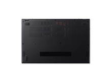 Charger l&#39;image dans la galerie, Vue du dessous d&#39;un ordinateur portable noir, montrant les aérations et les vis, sur fond blanc.
