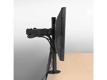 Charger l&#39;image dans la galerie, Moniteur fixé à un support de bureau. Moniteur et support noirs. Bureau brun clair.
