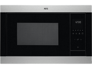 Micro-ondes AEG avec affichage numérique indiquant 12h30 et des boutons de commande.