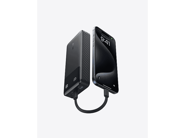 Un chargeur portable connecté à un téléphone. Le chargeur est noir et le téléphone est noir avec l'heure 9h41.