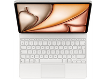 Charger l&#39;image dans la galerie, Un iPad avec un clavier attaché. L&#39;écran affiche un design avec une pomme dorée.
