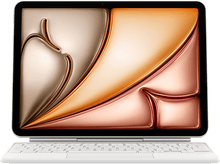 Charger l&#39;image dans la galerie, Un ordinateur portable blanc avec clavier affiche un design abstrait orange et marron sur noir.
