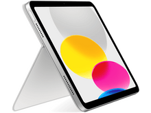 Charger l&#39;image dans la galerie, Un iPad avec un support de couverture. L&#39;écran affiche un motif abstrait coloré. Il est argenté.
