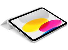 Charger l&#39;image dans la galerie, Un iPad ouvert avec un écran coloré, posé sur une surface blanche avec une coque blanche partiellement ouverte.
