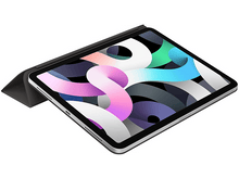 Charger l&#39;image dans la galerie, Un iPad Air d&#39;Apple avec une coque. L&#39;écran affiche une image abstraite colorée.
