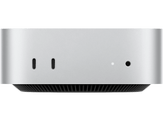 Ordinateur Mac mini argent, vue de face montrant deux ports et une lumière d'alimentation.