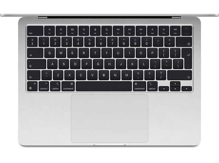 Vue de dessus d'un clavier d'ordinateur portable. L'ordinateur portable est ouvert, montrant les touches et l'écran.