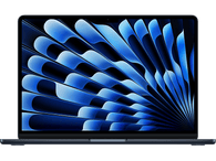 Ordinateur portable bleu foncé sur fond noir. Écran avec design abstrait bleu.