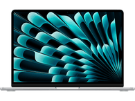 Ordinateur portable argenté avec un design abstrait turquoise sur l'écran, sur fond noir.