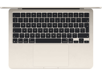 Un clavier d'ordinateur portable avec une base beige et des touches noires, vue de dessus.