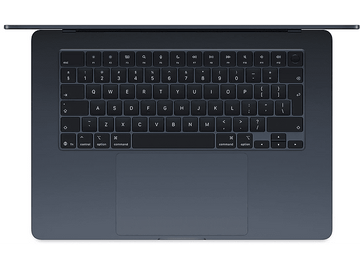 Clavier d'ordinateur portable, vue de dessus. Couleur gris foncé. Fond blanc. L'écran est fermé.