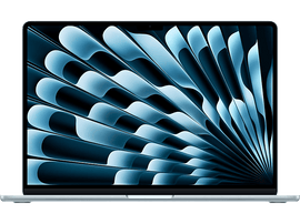 Ordinateur portable argenté ouvert sur une surface noire. L