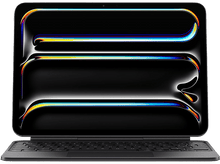 Charger l&#39;image dans la galerie, Tablette noire avec clavier. L&#39;écran affiche un design abstrait avec des lignes colorées.
